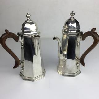 Pair of silver hot water and coffee pots 